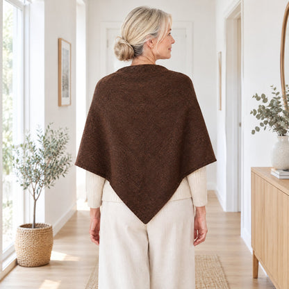 Back view of The Loop Shawl in brown draped over the shoulders